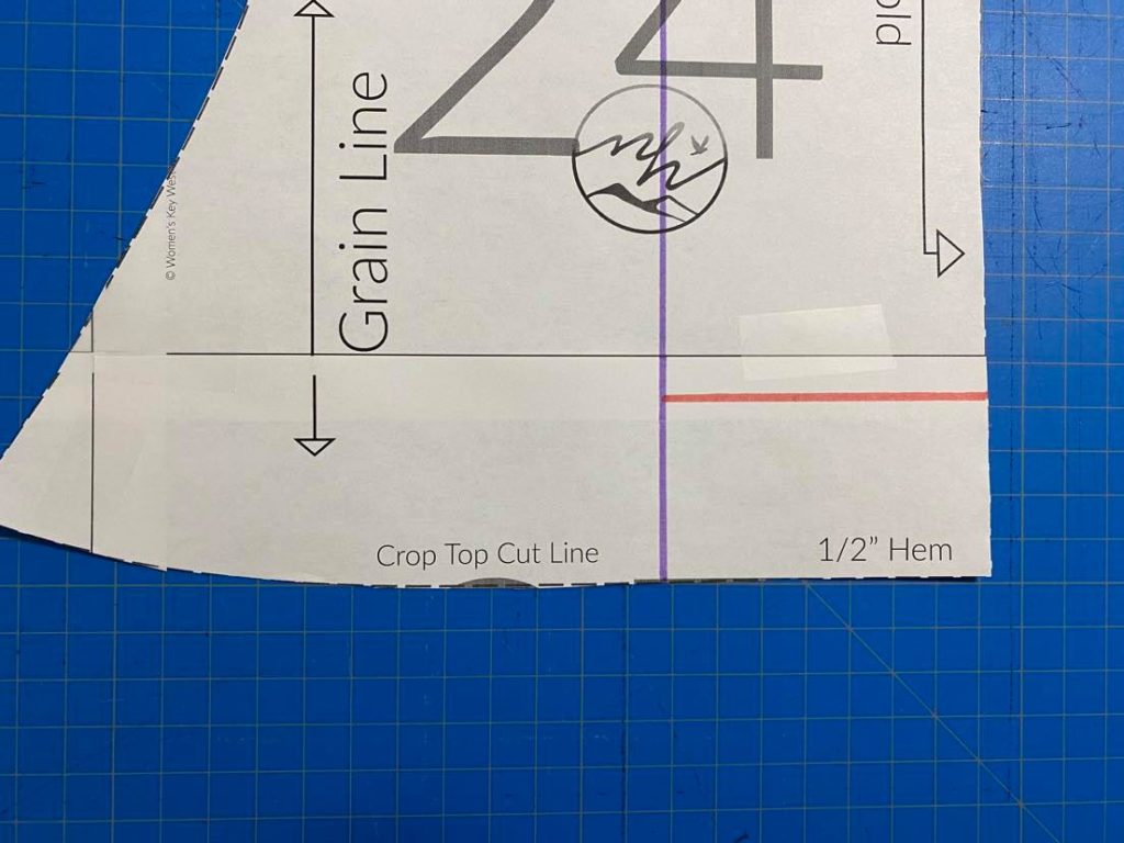 Draw line a few inches above hem from center line to fold line